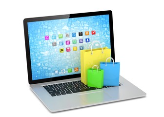 laptop and  shopping pags on white background. 3d rendering.