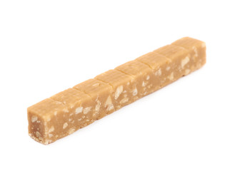 Toffee candy with nuts isolated