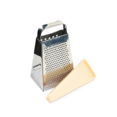 Grater and parmesan cheese isolated