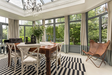 Luxurious dining room with a garden view