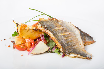 Fried fish fillet with garnish