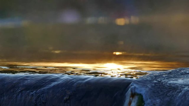 The reflection of the sun in the hot springs. Ranong, Thailand.