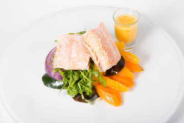 Salmon steak with vegetables