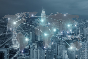 Networking concept - Network and world map on blur city use for