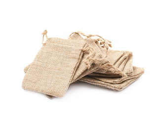 Tiny sackcloth bag isolated