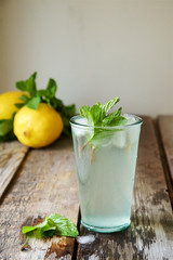 Cold homemade  lemonade with lemon and mint 