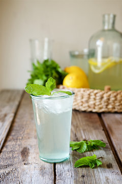 Cold homemade  lemonade with lemon and mint 
