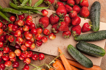 Healthy fresh vegetable on flat wood background, high in antioxidants, anthocyanins, vitamins, dietary fiber and minerals