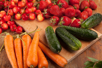 Healthy fresh vegetable on flat wood background, high in antioxidants, anthocyanins, vitamins, dietary fiber and minerals