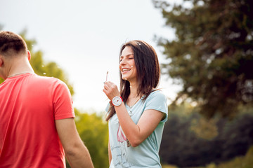 Young couple at sunset in the park.