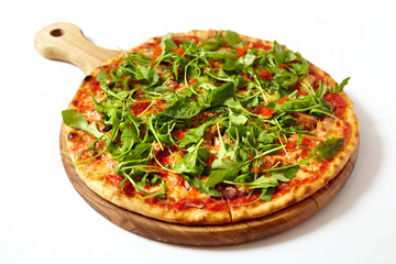 Pizza with seafood and arugula isolated on white