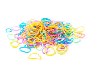 Fototapeta premium Pile of multiple loom bands isolated