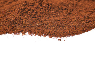 Pile of the ground coffee flakes isolated