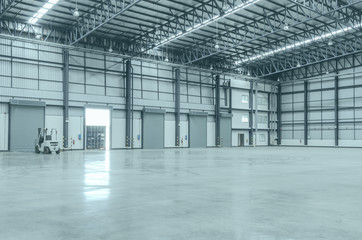 Shutter door inside factory and Empty warehouses.