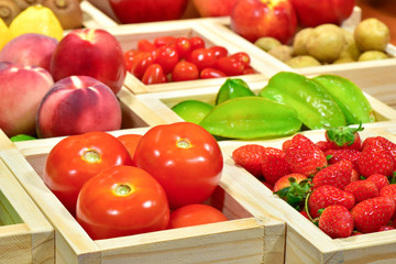 Close-up Tomatoes in wooden box at the supermarket