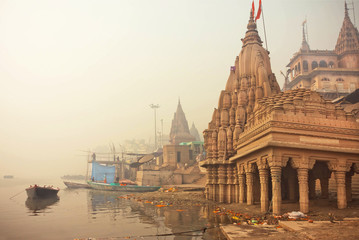 Early morning at Ganges river near flooded temple