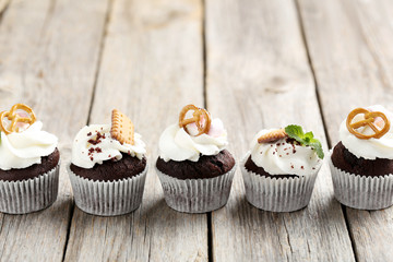 Chocolate cupcakes on a grey wooden table