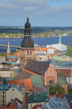 The steeple of the Dumskaya cathedral, sunny day in may in the old Riga. Latvia