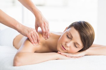 Obraz na płótnie Canvas Relaxed woman enjoying back massage