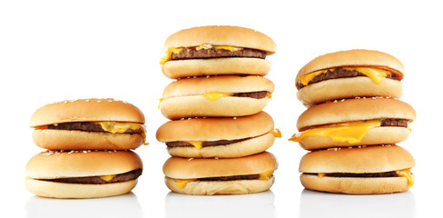 Tasty cheeseburgers, isolated on white