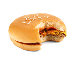Bitten cheeseburger, isolated on white