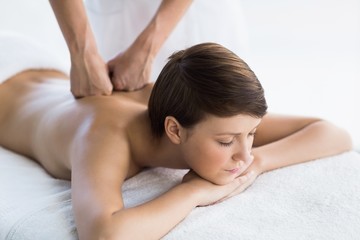 Fototapeta na wymiar Relaxed woman enjoying back massage