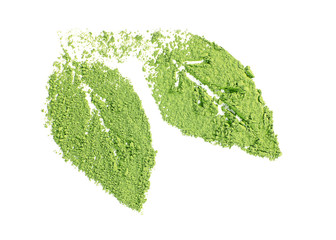 Powdered matcha green tea in leaves shape, isolated on white © Africa Studio