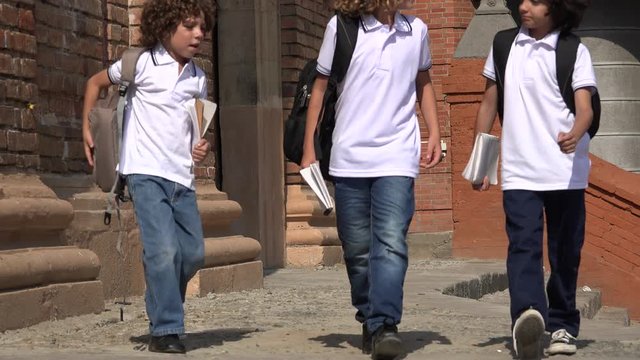 Happy Children Walking At School