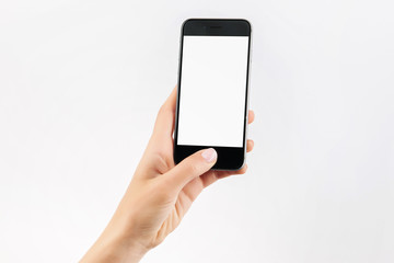 Hand with a black cell phone with white screen isolated 