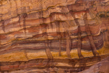 Beautiful stone colors in a cave in ancient Petra Jordan