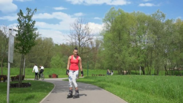 2 in 1 video. Girl riding a roller skates in the park. 
