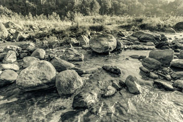 Reshi River water flowing on rocks at dawn, Sikkim, India
