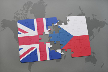 puzzle with the national flag of great britain and czech republic on a world map background