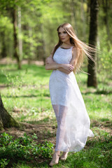 portrait of young woman in the forest