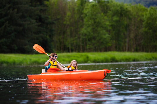 Mother and child in a kayak