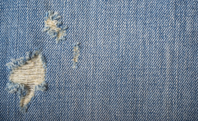 Blue torn denim jeans texture with space for text - 114557330