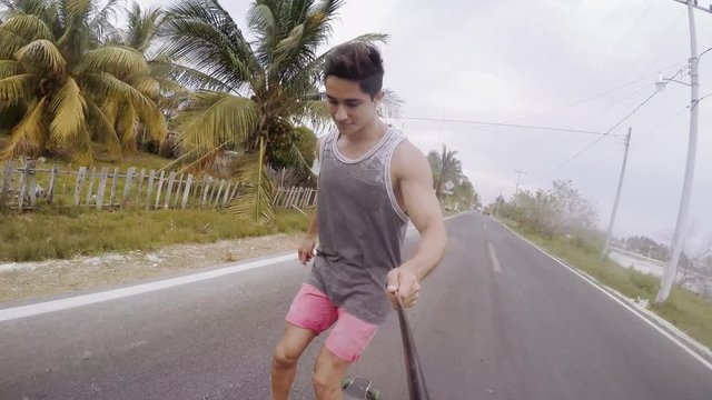 Friends skateboarding on street and taking selfie  having fun