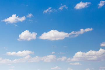 clouds in the blue sky as background