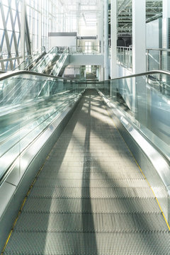 Interior escalators in a big shopping mall 