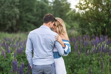 loving couple embracing each other in nature