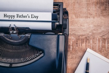 Happy fathers day written on paper