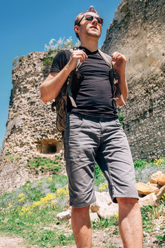 Tourist walk on the castle ruin territory