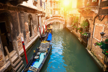 Fototapeta na wymiar Canal with gondola in Venice, Italy