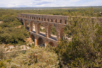 Pont du Gard is an old Roman aqueduct near Nimes in Southern France