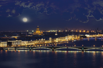 Fototapeta na wymiar Evening view from the Neva river to St. Isaac's Cathedral and the Bridge