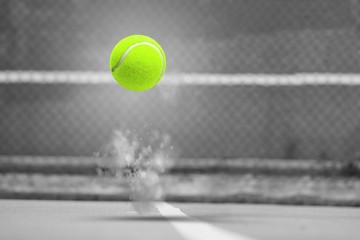 Composite image of tennis ball with a syringe - Powered by Adobe