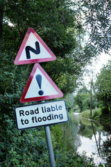 road side flooded sign