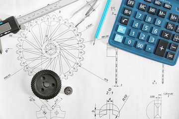 Engineering drawings of parts with tools, top view