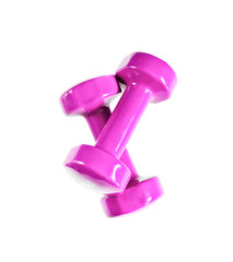 Pink dumbbells isolated on a white background
