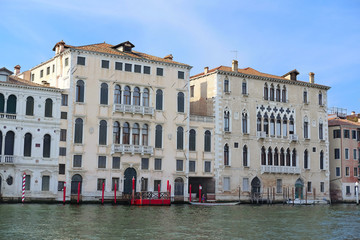 Venice, Italy, June, 21, 2016: landscape with the image of boats on a channel in Venice, Italy
